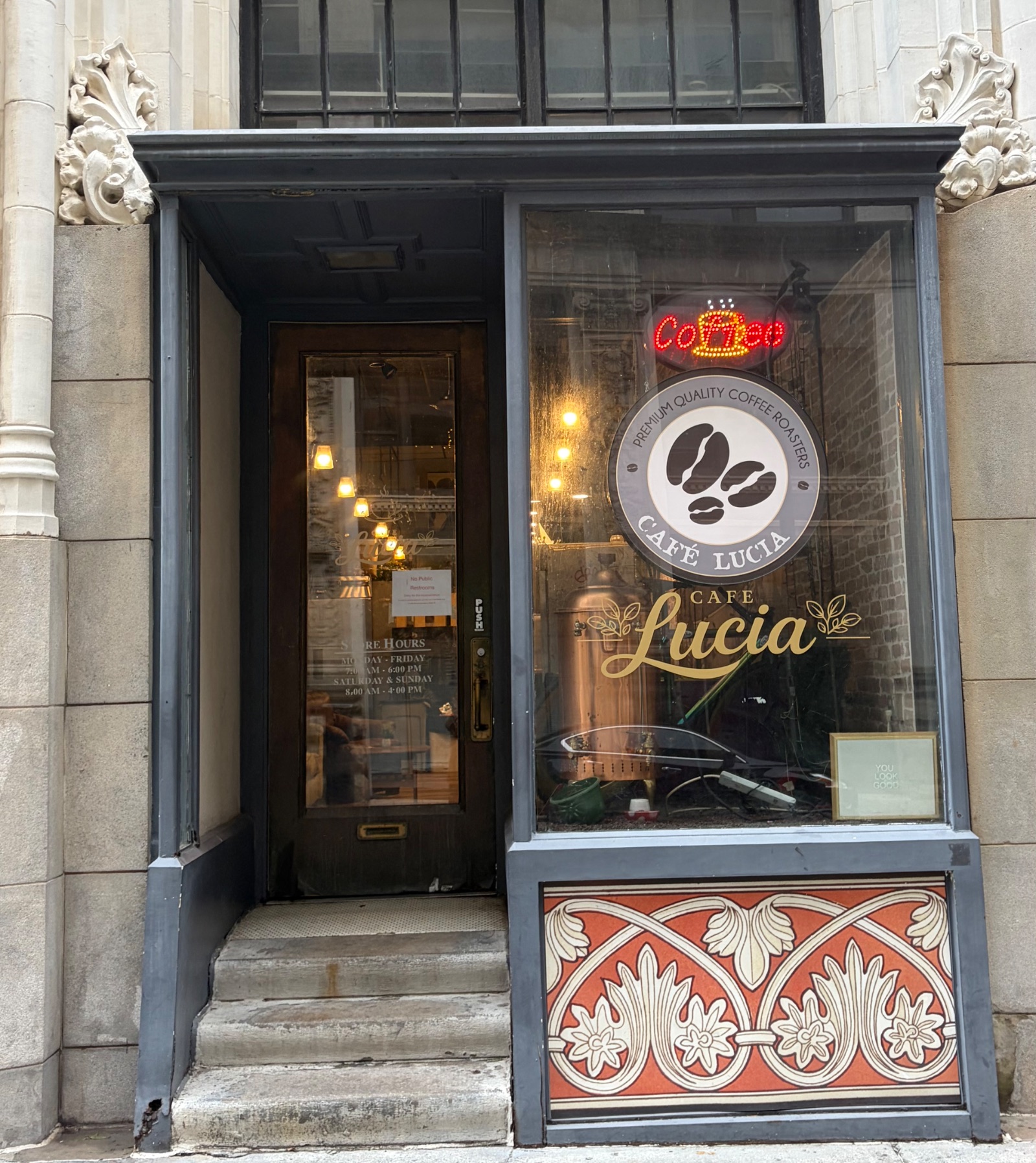 This is the front façade of Café Lucia located in the historic Henley Building in Atlanta.  I stumbled upon this hidden treasure after my phone went dead while I was looking for my morning coffee. Café Lucia is dripping with coolness. I did not take a picture of the menu board or my cup of coffee before they closed for the afternoon, but I promise a visit here is definitely worth your time.